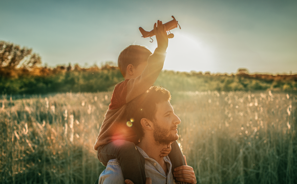 Dad With Boy In High Field