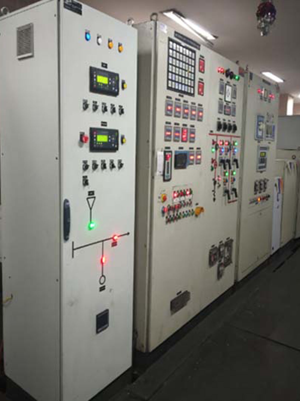 DEIF AGC-4 controllers in a switchboard at Singhal Enterprises