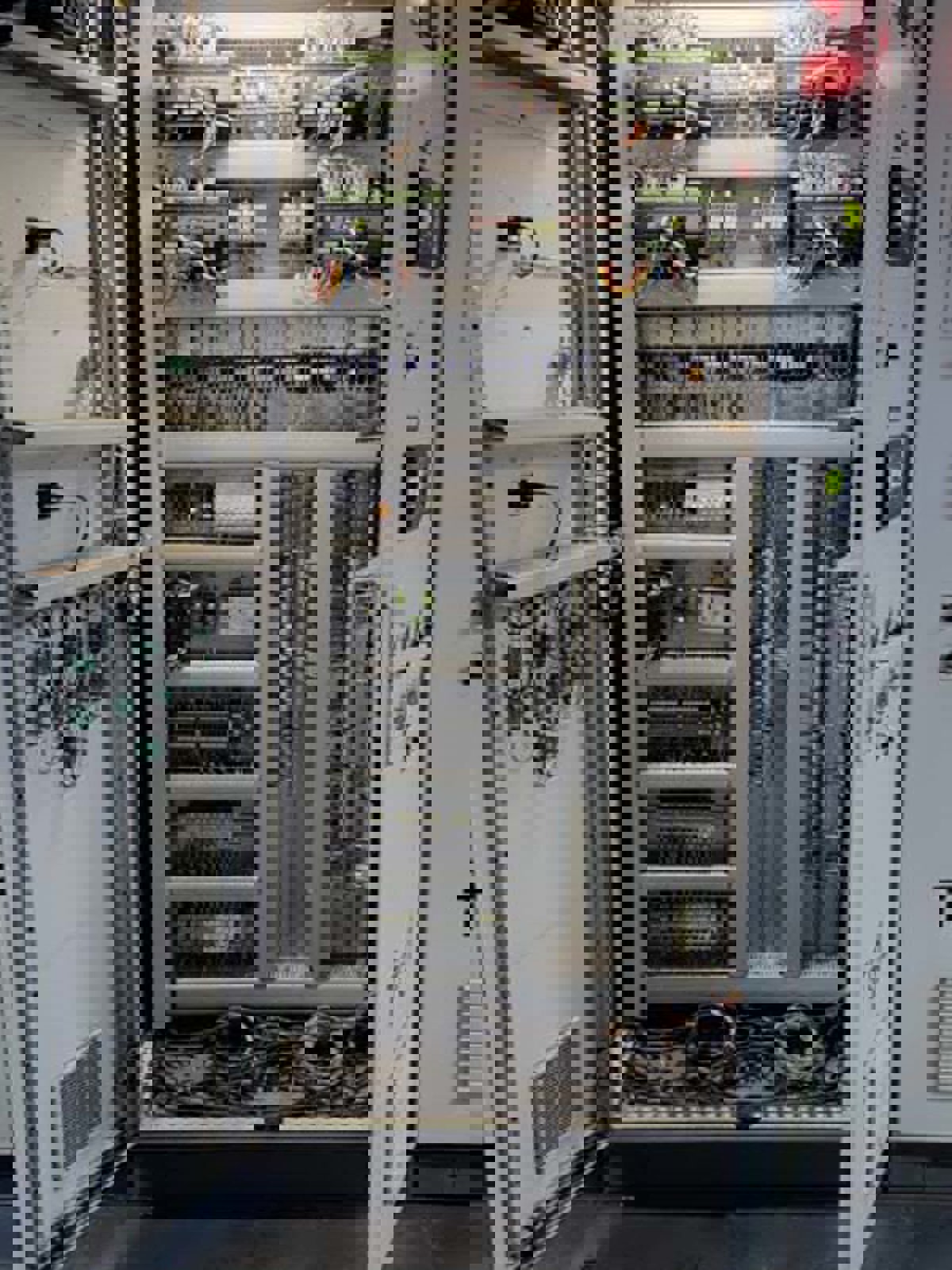DEIF AGC-4 controllers in a switchboard at Singhal Enterprises